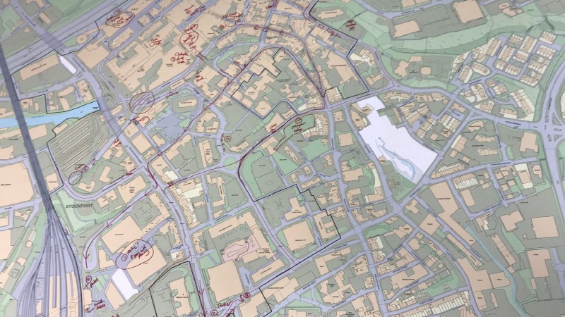 Printed map of Stockport with routes scribbled on it