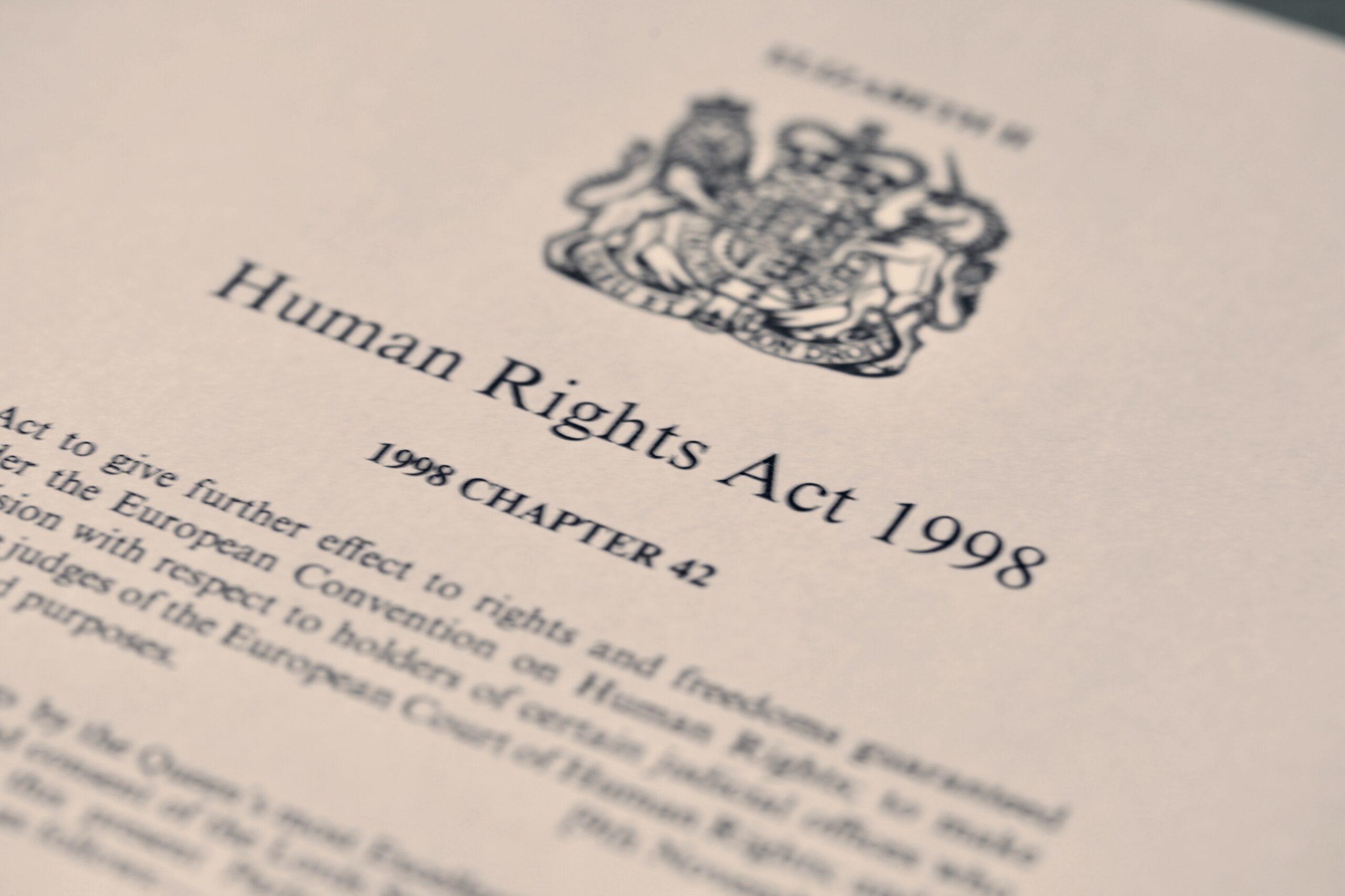 A photograph of the first page of the Human Rights Act (1998) document