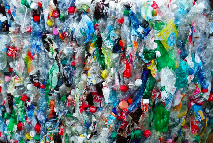 A bale of plastic bottles crushed together