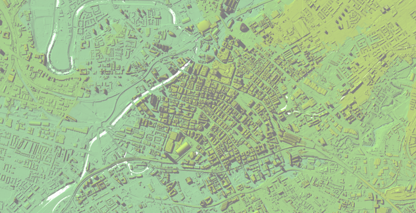 A green satellite image of a town.