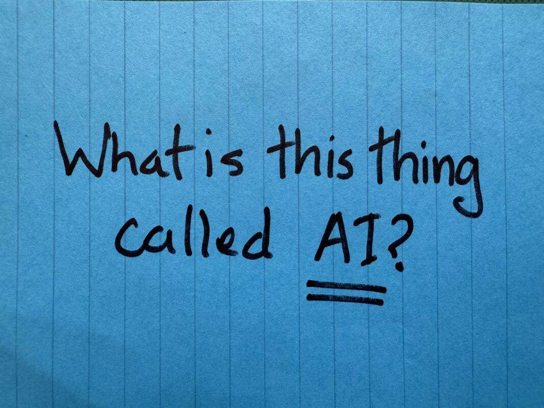 What is this thing called AI written on a blue Post-it
