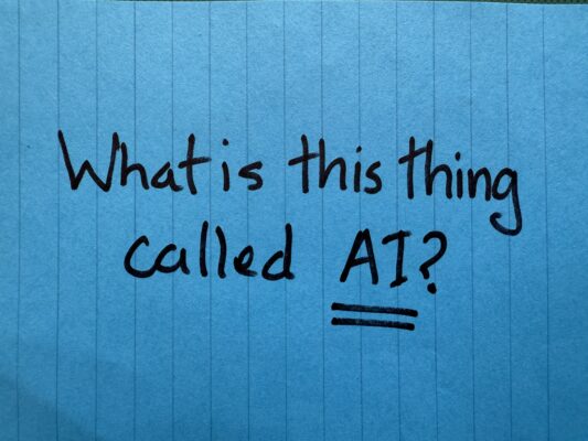 What is this thing called AI written on a blue Post-it